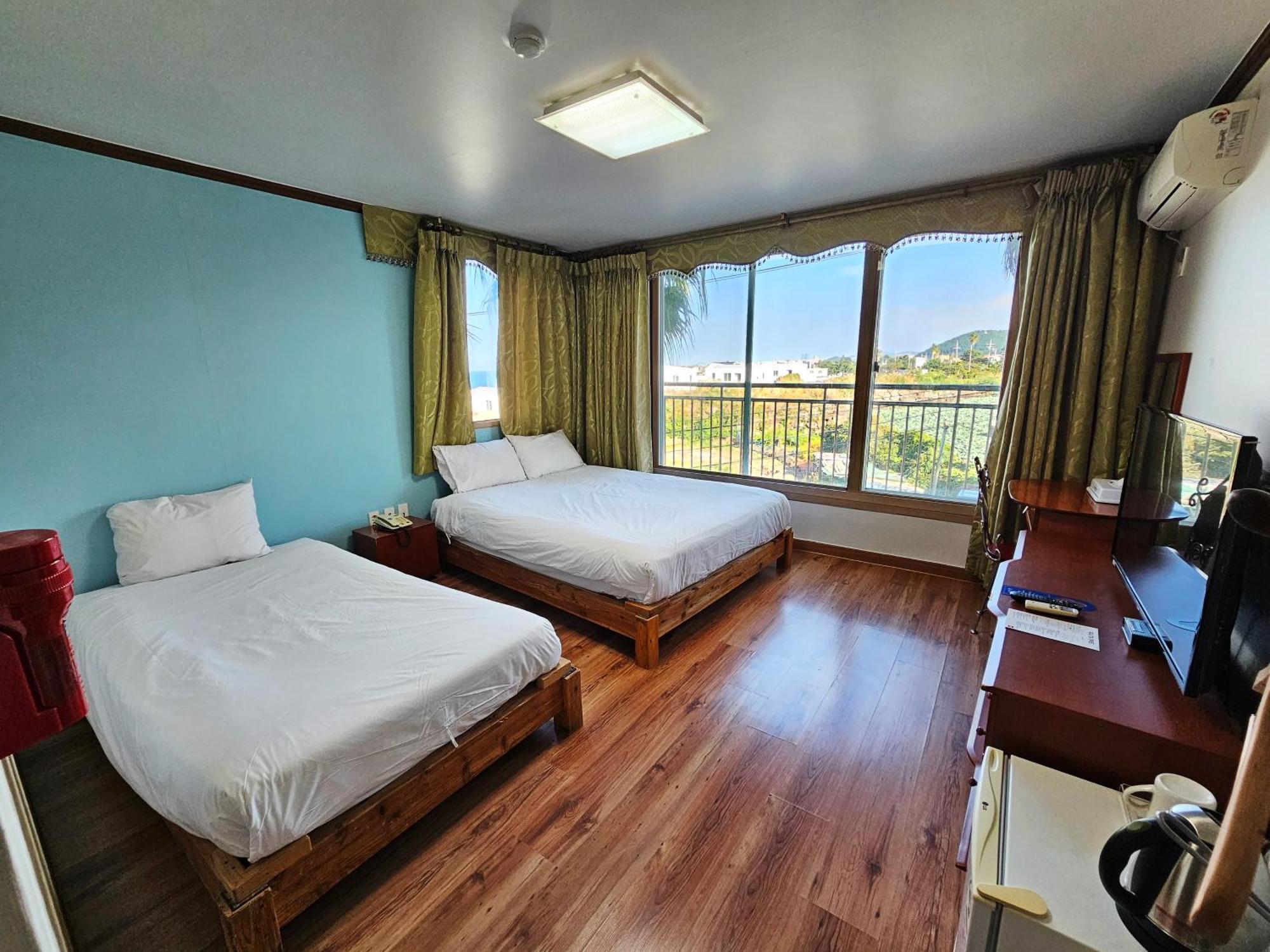Sea Cliff Hotel Jeju Rum bild